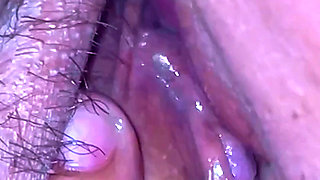 A lustful masseur caught the MILF off guard and licked her all over from behind, exploring her hairy pussy