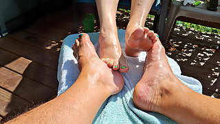 Massage oil on our feet for us while we relax
