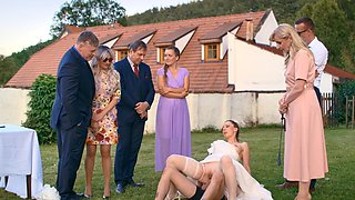 Aroused bride shared by her family in a loud outdoor cuckold fetish