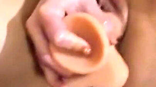 Teen Plays with First Dildo