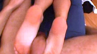 Petite redhead enjoys foot fetish session