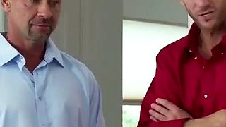 Two fellows share a super hot honey in the kitchen