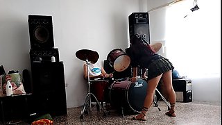 He Play the Drums for Her - She Dances, Stripping and Showing Her Ass