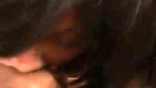 Tattooed ebony sucks a hard black cock