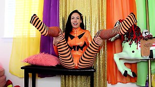 Slender brunette in nylons poses seductively on webcam