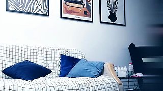 Cute amateur asian web cam girl playing with her toy