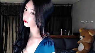 Hot Asian busty camgirl shows her body