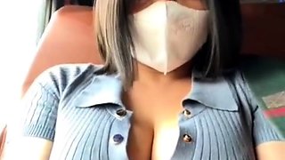 Asian teen on the bus showing off her beautiful body 8542389