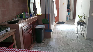 Mom in the kitchen in bralett