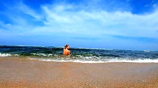 Blonde Babe's Naked Swim in the Ocean