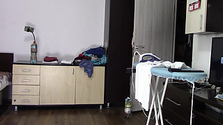 Amateur Wife Dancing Naked at Home. Amateur Woman Has Fun Trying on Clothes and Cutting Them.