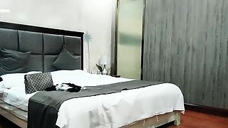 Cute amateur asian web cam girl playing with her toy