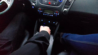 Amateur MILF gives a handjob to a taxi driver and teases him in the car, in public