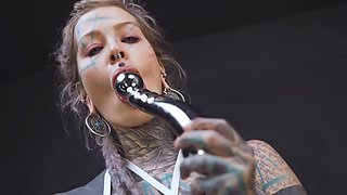 Anuskatzz grabs her cold, stainless steel toy and slides it deep into her tight ass