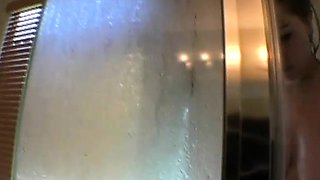 Alluring brunette Chelsea exposes her wonderful big tits in the shower