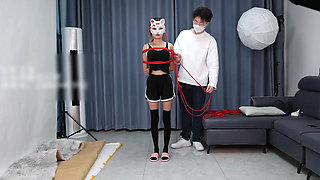 A Young, Beautiful, Slender, and Adorable Girlfriend, with Black Stockings, Red Strings, and Restraints