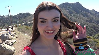 Public romance with a brunette beauty in a car