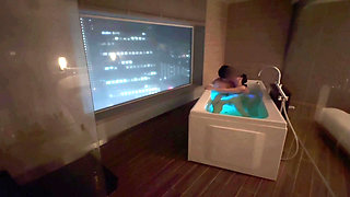 Amateur couple are lovey-dovey in hotel bath with night view. And intense sex with standing back. Japanese amateur hentai