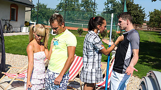 A group of sexy chicks are having a pool party with banging