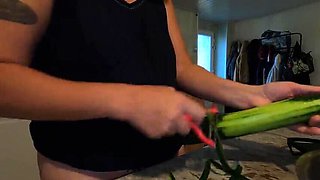 Hot French MILF Kahann masturbates with cucumber in kitchen close-up amateur video
