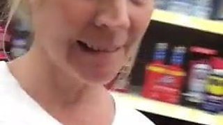 Hot mature lady flashing in the store