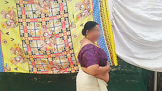 Traditional kerala style dressed Bhabi showing her huge sexy boobs, walking topless