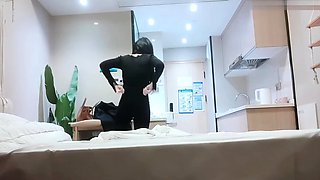 Cute amateur asian web cam girl playing with her toy