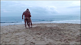 Romantic Dance of a Naked Couple on a Beach