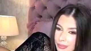 Brunette seductress working her big boobs and hot ass