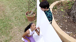 Black yoga milf lost in lust for young white cock outside