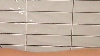 Big Boobed Blonde Masturbates With A Dildo In The Bathroom