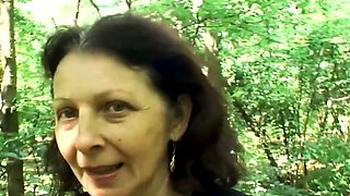 Hairy pussy granny fucks in the woods