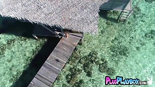 Gorgeous blond hair lady mommy posing on the sea