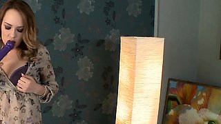 Redheaded amateur MILF with a sex toy on webcam show