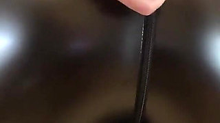 Testing Out New Butt Plugs in a Latex Suit