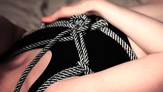 Chest bondage and rope wind round legs