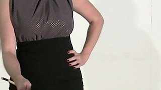Spanked and Caned by Strict Miss Wood
