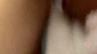 Masturbating in a bra panties and black stockings