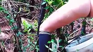 Peeing on a Toilet in the Woods