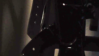 Rubber slut fucking her pussy