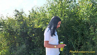 Sexy Brunette Trying Hard to Empty Her Bladder Outside, Then Quick Pee Next to a House in Construction