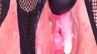 My Creamy Pussy in Fishnet Stockings Achieves Orgasm From a Vacuum Vibrator on My Clit Without Taking off Panties