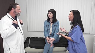 Two hot nurses, Lily Lane and Nova Vixen, in a steamy ffm scene.